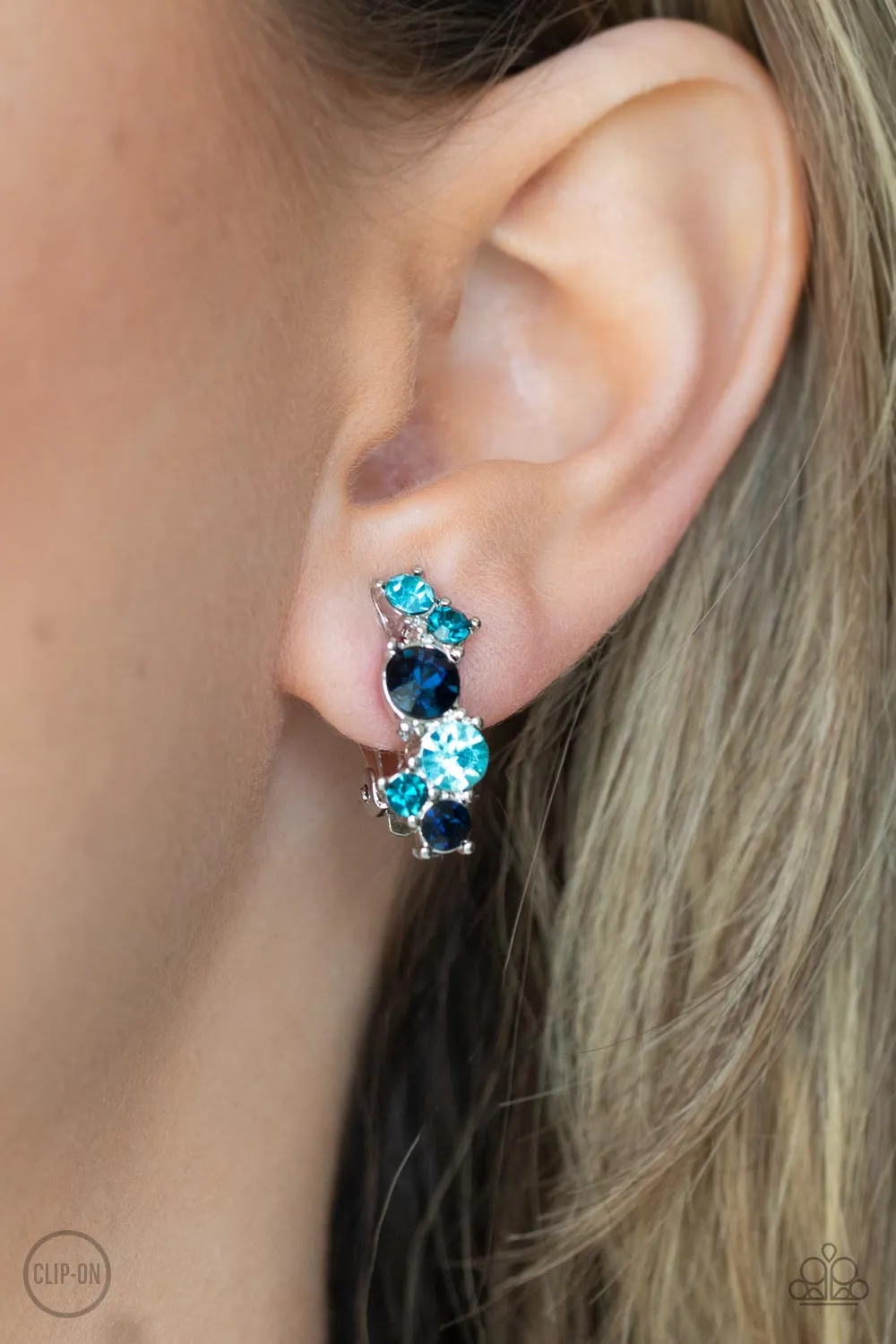 Cosmic Celebration Blue Rhinestone Clip-on Earrings - Paparazzi Accessories