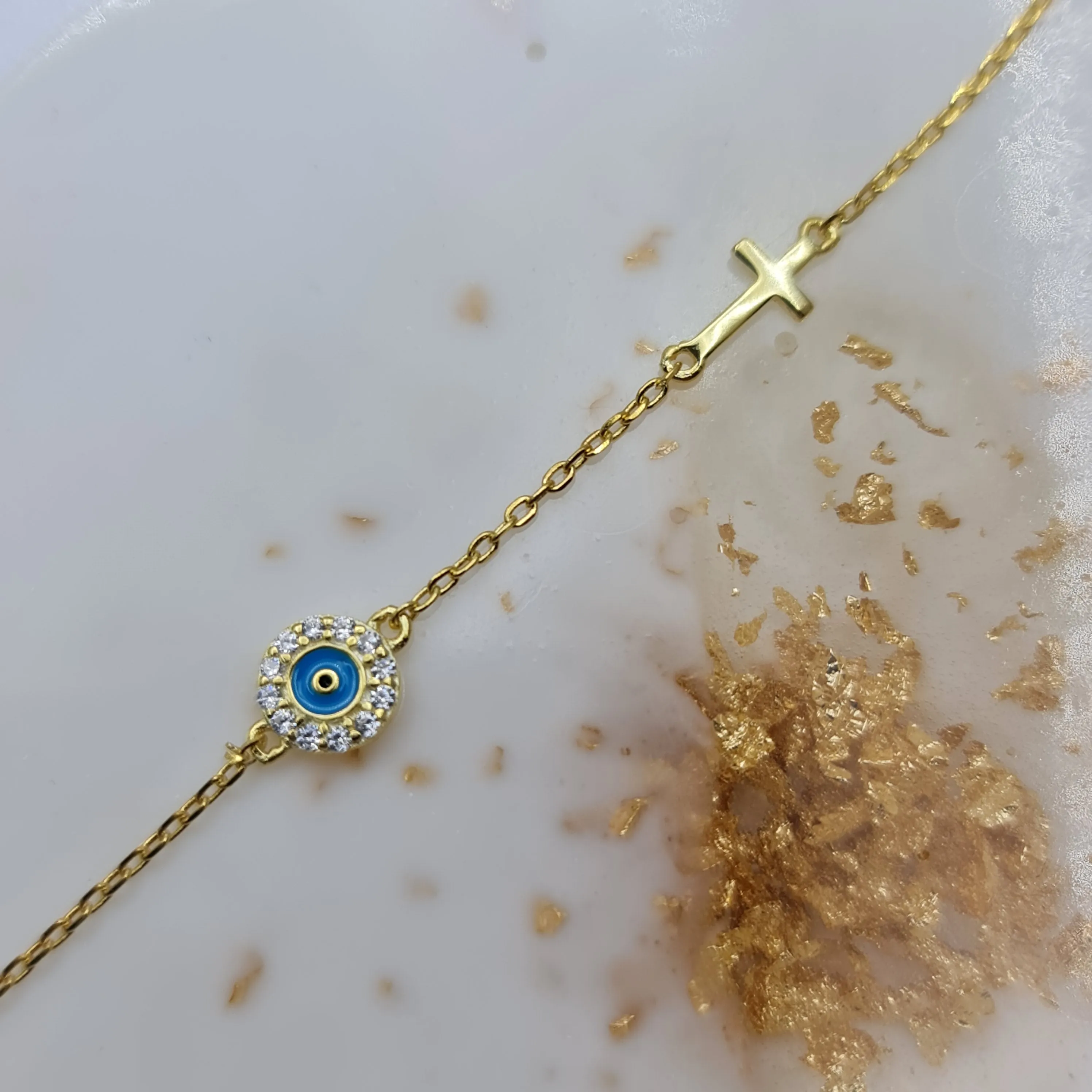 Dion blue evil eye and cross cz bracelet in gold