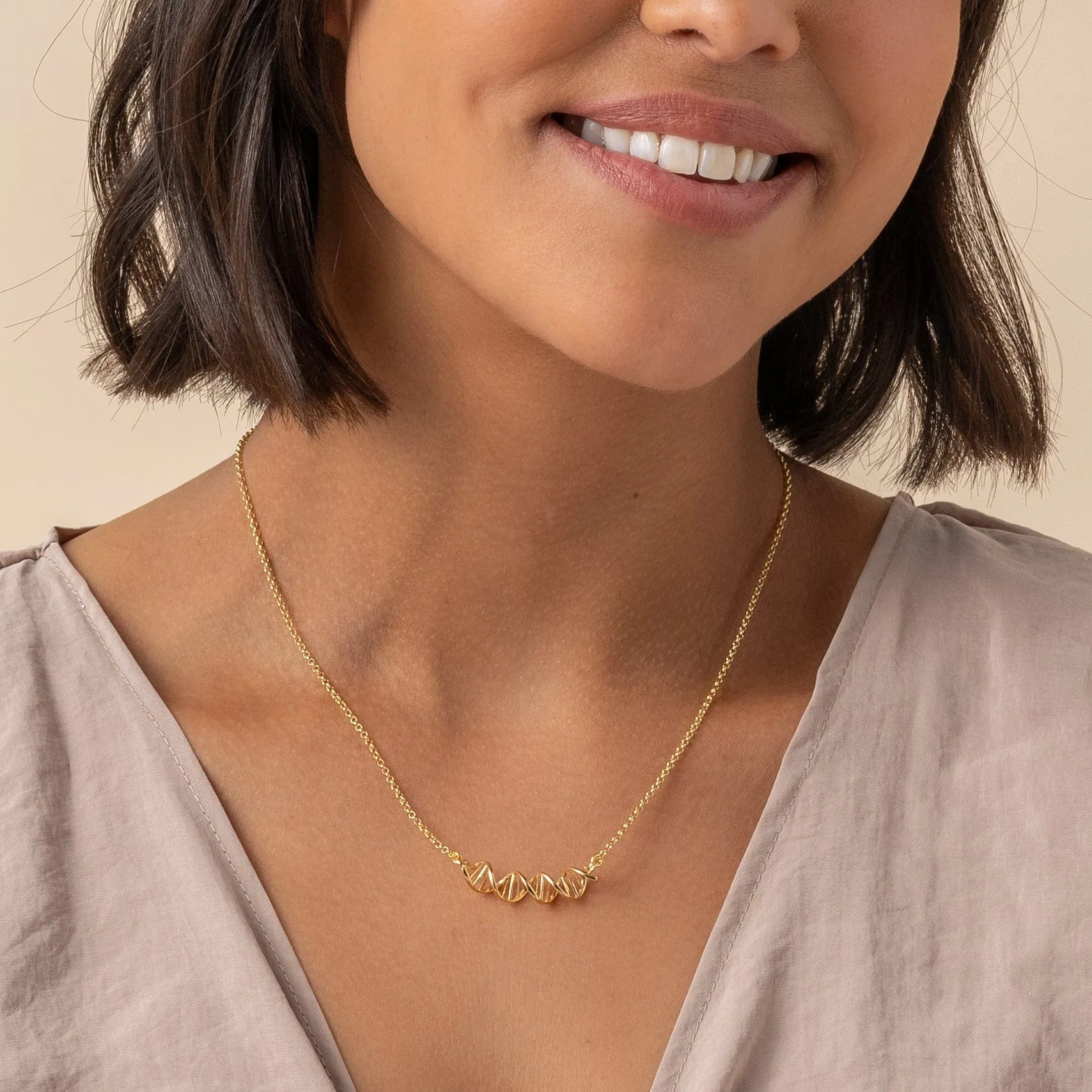 DNA necklace H | gold vermeil